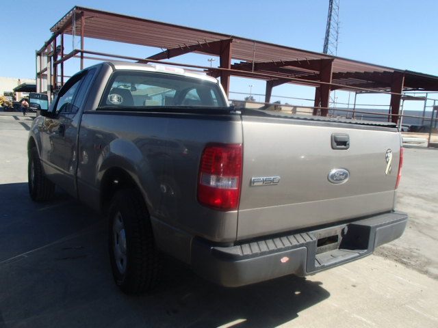 Used 2005 Ford F-150 Chassis Control Module 5L3Z14B321DA