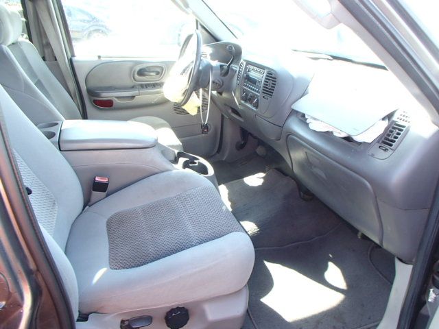4J6977_5 Used 2003 Ford F-150 Keys / Latches / Locks LH