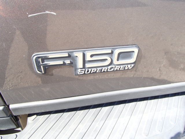 4J6977_9 Used 2003 Ford F-150 Keys / Latches / Locks LH