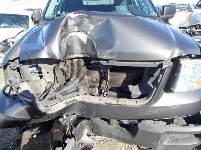 5B7043_10 Used 2004 Ford Expedition Wheel