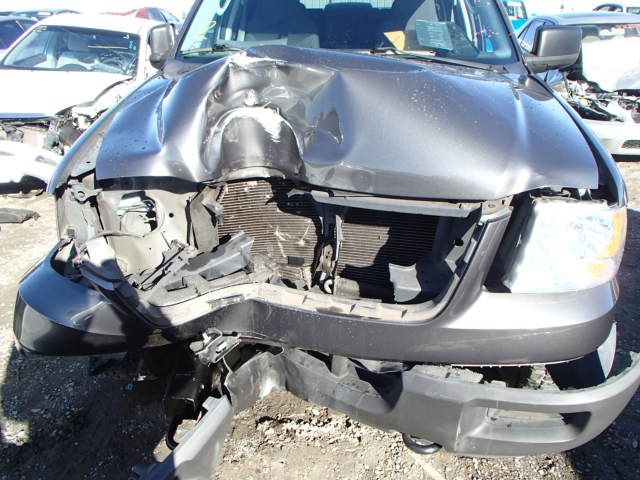 5B7043_7 Used 2004 Ford Expedition Wheel